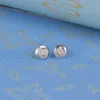 Sleek Silver Round Stud Earrings with Clear Crystal Accents - Image 2