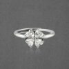 Elegant Adjustable Sterling Silver Ring with Four Heart-Shaped White Cubic Zirconia Stones in a Clover Design - Image 3