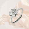 Elegant Adjustable Sterling Silver Ring with Four Heart-Shaped White Cubic Zirconia Stones in a Clover Design - Image 2